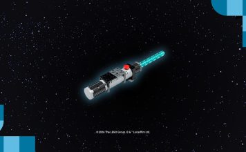 A brick-built LEGO Star Wars Lightsaber model with a glowing blue blade against a starry space background.