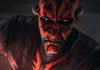 Close-up of Darth Maul in Star Wars: Maul – Shadow Lord, showing his iconic red and black facial markings, intense orange eyes, and the textured, painterly animation style of the new series.