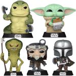 A collection of five leaked Star Wars Funko Pops for "The Mandalorian & Grogu," featuring a muscular green Hutt-like creature with axes, Grogu eating a snack, a tall slender green alien with a spear, an Anzellan character, and Din Djarin with a shield and vibroblade.
