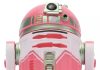 New QT-KT Droid Factory Figure Joins the 2026 Build-A-Droid Series Close-up front view of the QT-KT Droid Factory action figure, featuring a vibrant pink and white dome with silver metallic accents and a black primary photoreceptor lens.