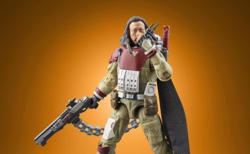 A detailed action figure of Baze Malbus from Star Wars Rogue One, part of The Vintage Collection, featuring his heavy repeating cannon and signature red and tan combat gear against an orange gradient background.