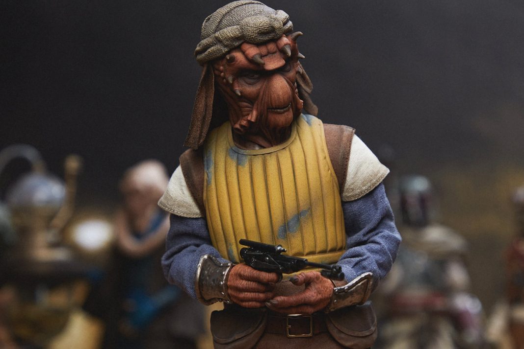 A high-detail sixth scale Sideshow Vizam figure wearing a yellow padded vest and holding a blaster pistol.