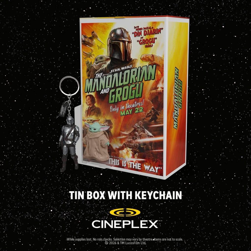 A collectible tin box with movie artwork and a Mandalorian keychain.